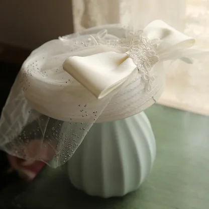 White Bridal Headpiece with Mesh Veil - Image 4